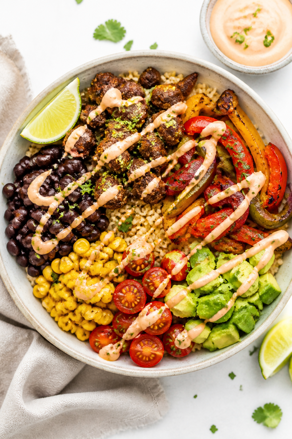Overhead “tasty top view” assembly shot: Southwest protein bowl in a wide ceramic bowl over a ba