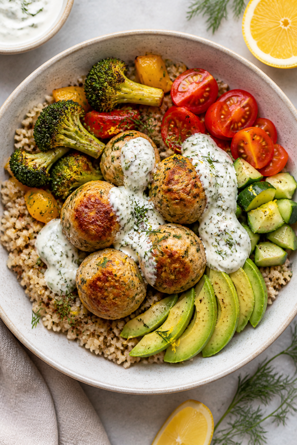 Tasty top view: Overhead shot of assembled High Protein Chicken Meatball Bowl—base of fluffy brown
